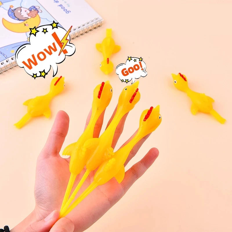 20 pcs Novelty Catapulted Ejection Chicken Toy Light Rubber Finger Prank Flying Toy Slingshot Chicken Finger Toys Turkey Sticky